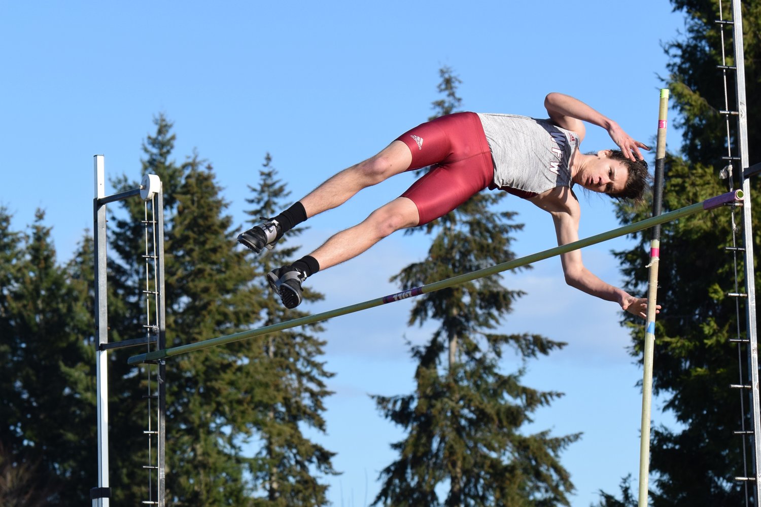 Elijah Annonen gets over the bar during W.F. West's meet at Tumwater on March 21.